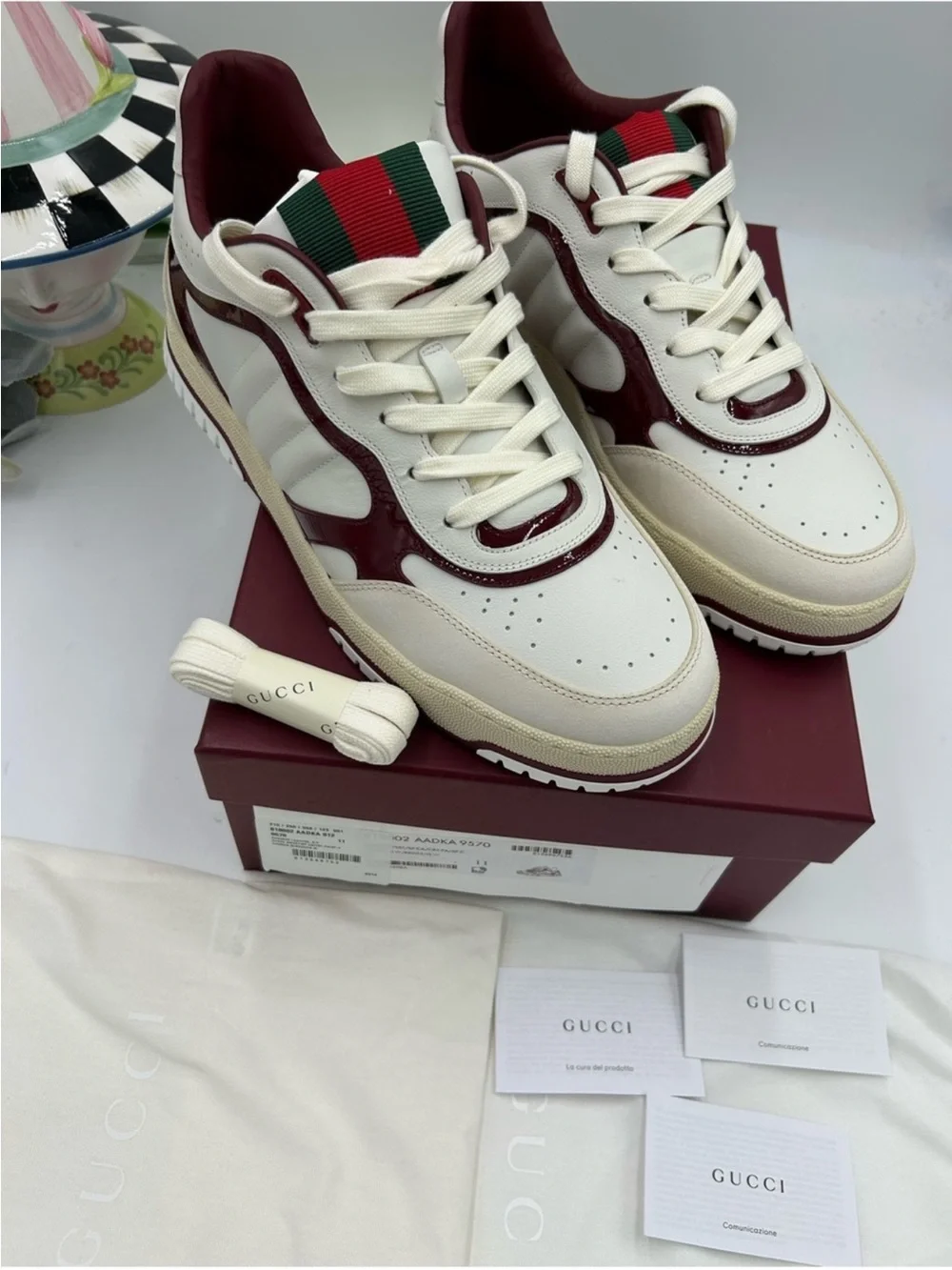 Men’s Gucci, re-web sneakers in white leather/patent trim size 11 fits 12 US